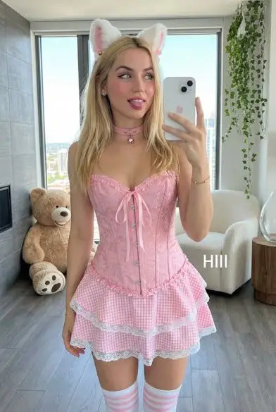 پیش‌نمایش Playful Mirror Selfie with Cat Ears and Pink Brocade Corset
