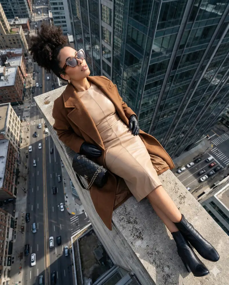 Preview of High-Angle Fashion Editorial on Skyscraper Rooftop Ledge