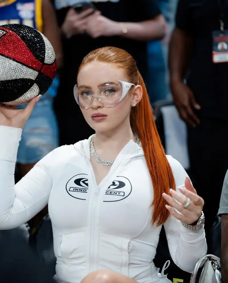 Preview of Cinematic Medium Shot of a Woman with a Luxury Basketball