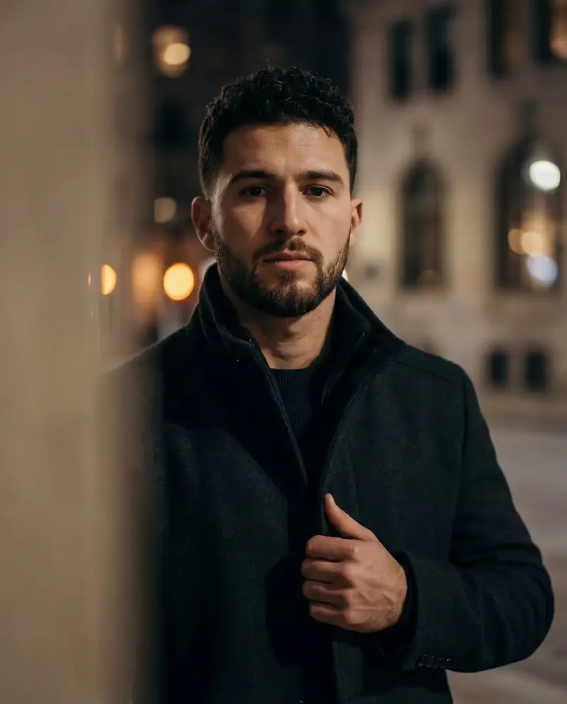 Preview of Cinematic low-key urban portrait prompt