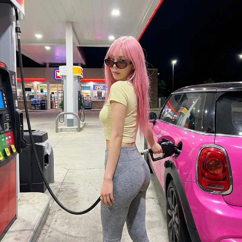 Preview of Exaggerated Curvy Figure at Gas Station
