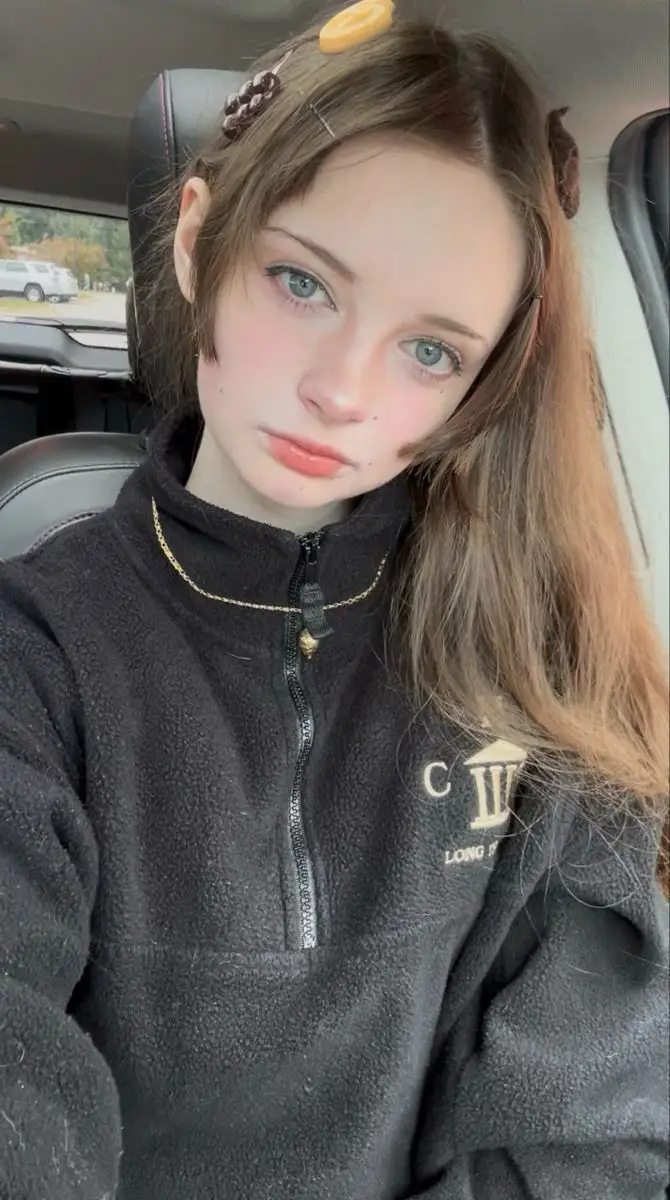 Preview of Close-up Candid Selfie Portrait of Young Woman
