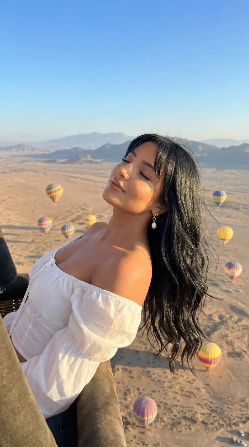 Preview of Cinematic Portrait of a Woman in a Hot Air Balloon over a Desert