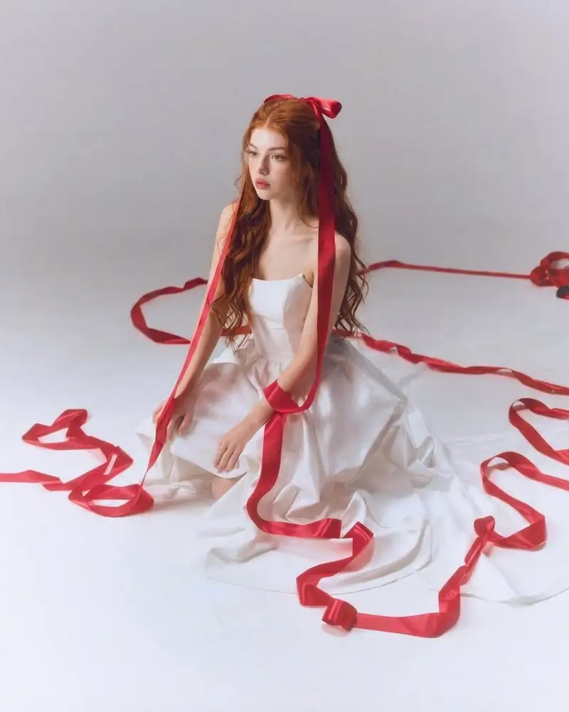 Preview of Fine-Art Studio Portrait with Red Ribbons